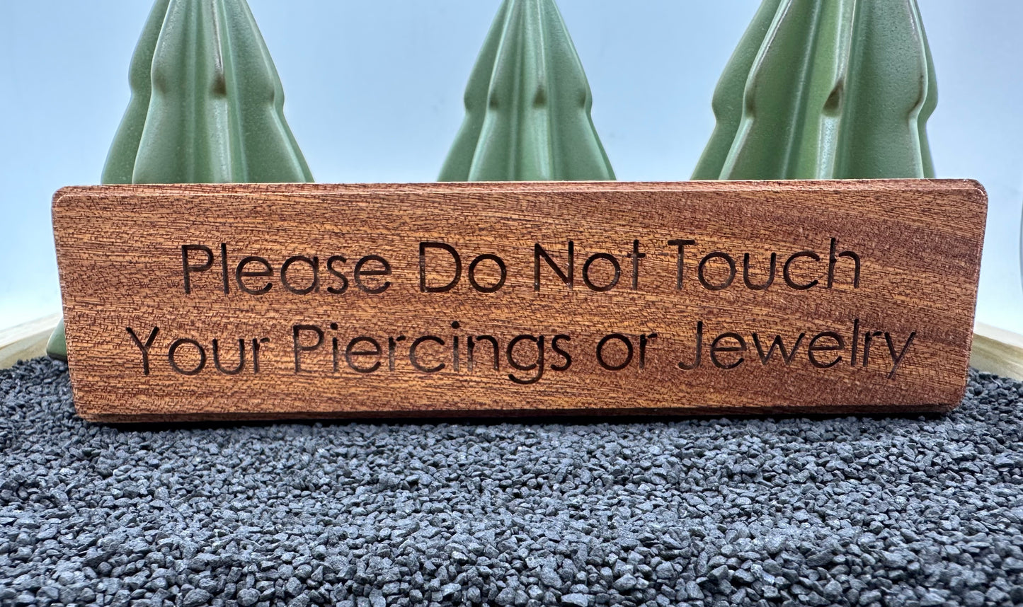 “Don’t Touch Your Jewelry…” Sign