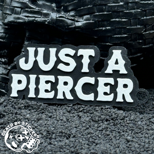 “Just a Piercer” Keychain