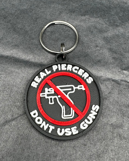 “Real Piercers Don’t Use Guns” Keychain