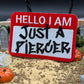 “Just a Piercer” iron on Patch