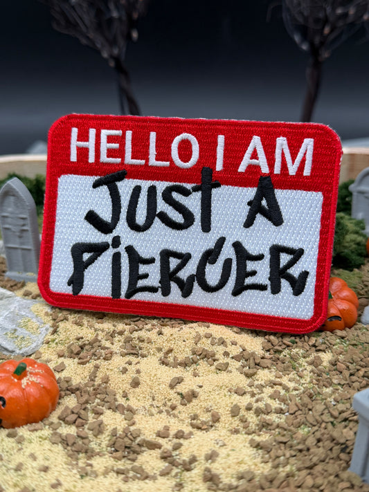 “Just a Piercer” iron on Patch