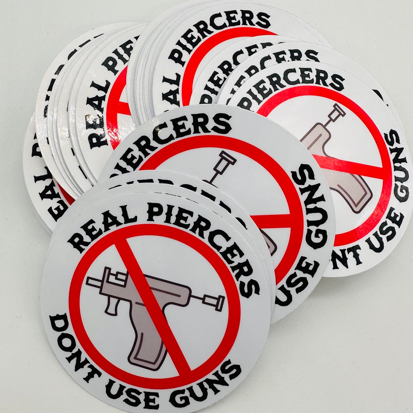 “Real Piercers Don’t Use Guns” Sticker