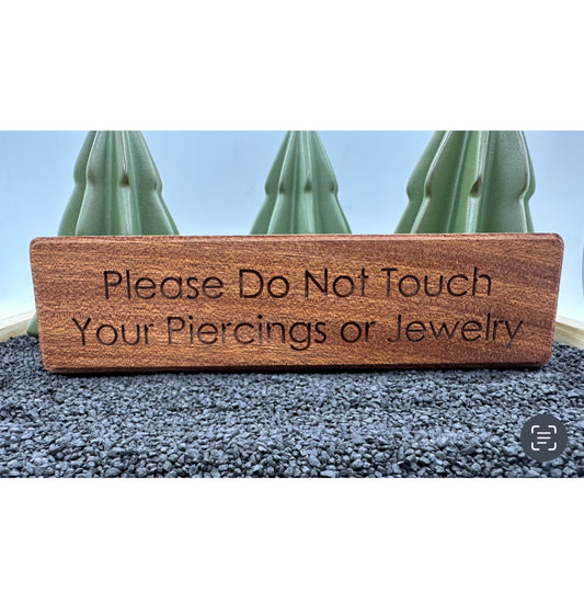 “Don’t Touch Your Jewelry…” Sign